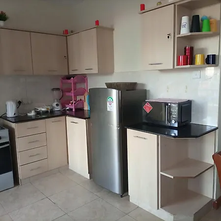Jkia Homestays Найроби Номер фото