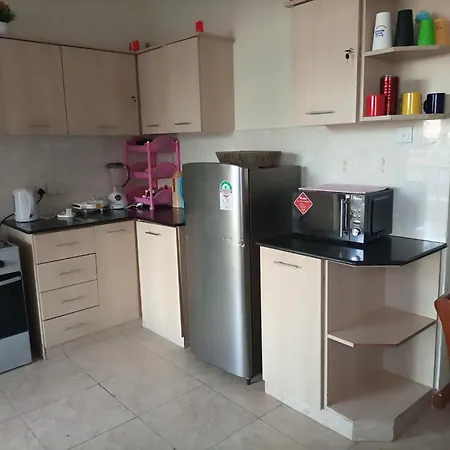 Jkia Homestays Найроби Номер фото